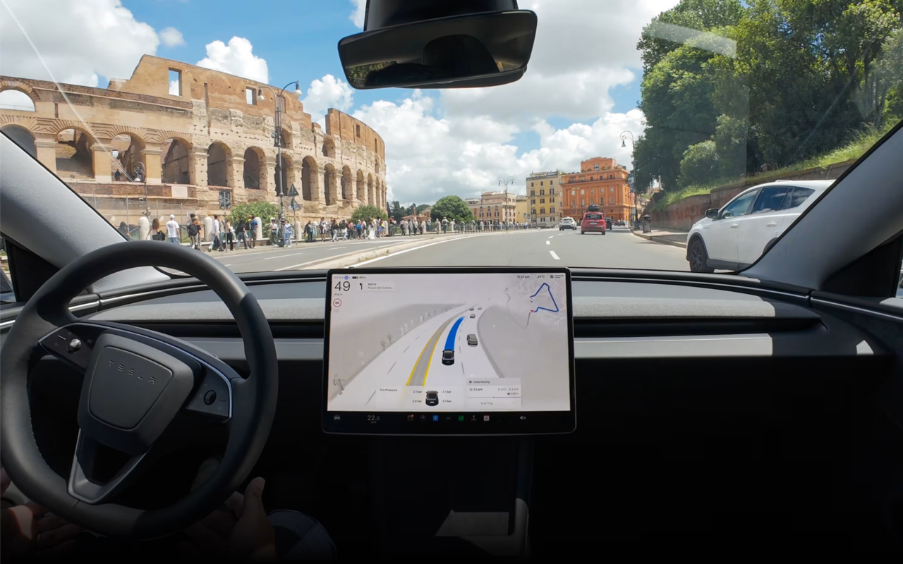 Inside a Tesla showing FSD Supervised interface
